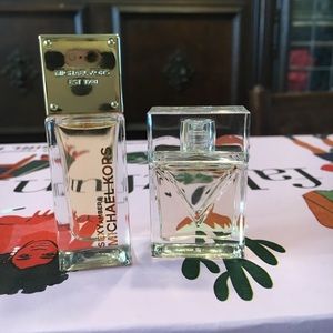 Two travel size Micheal Kors perfumes + Highlight